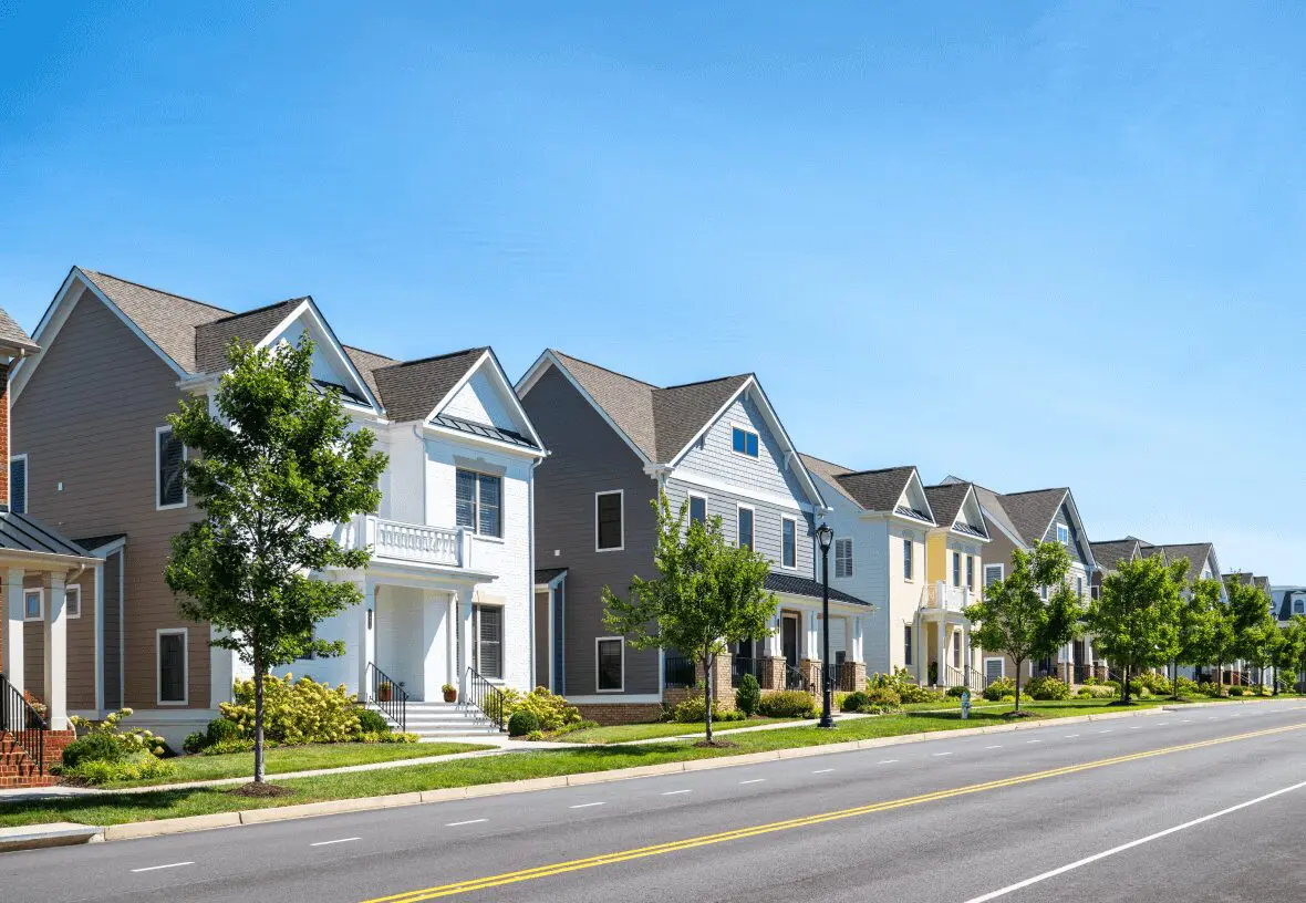 Suburban street with colorful modern houses.